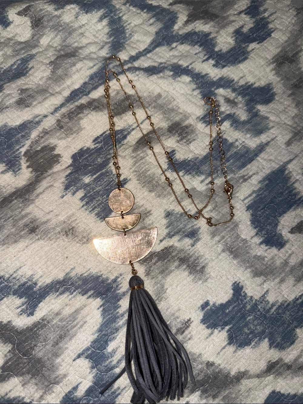 Gold-Tone Layered Crescent Necklace with Gray Tassel